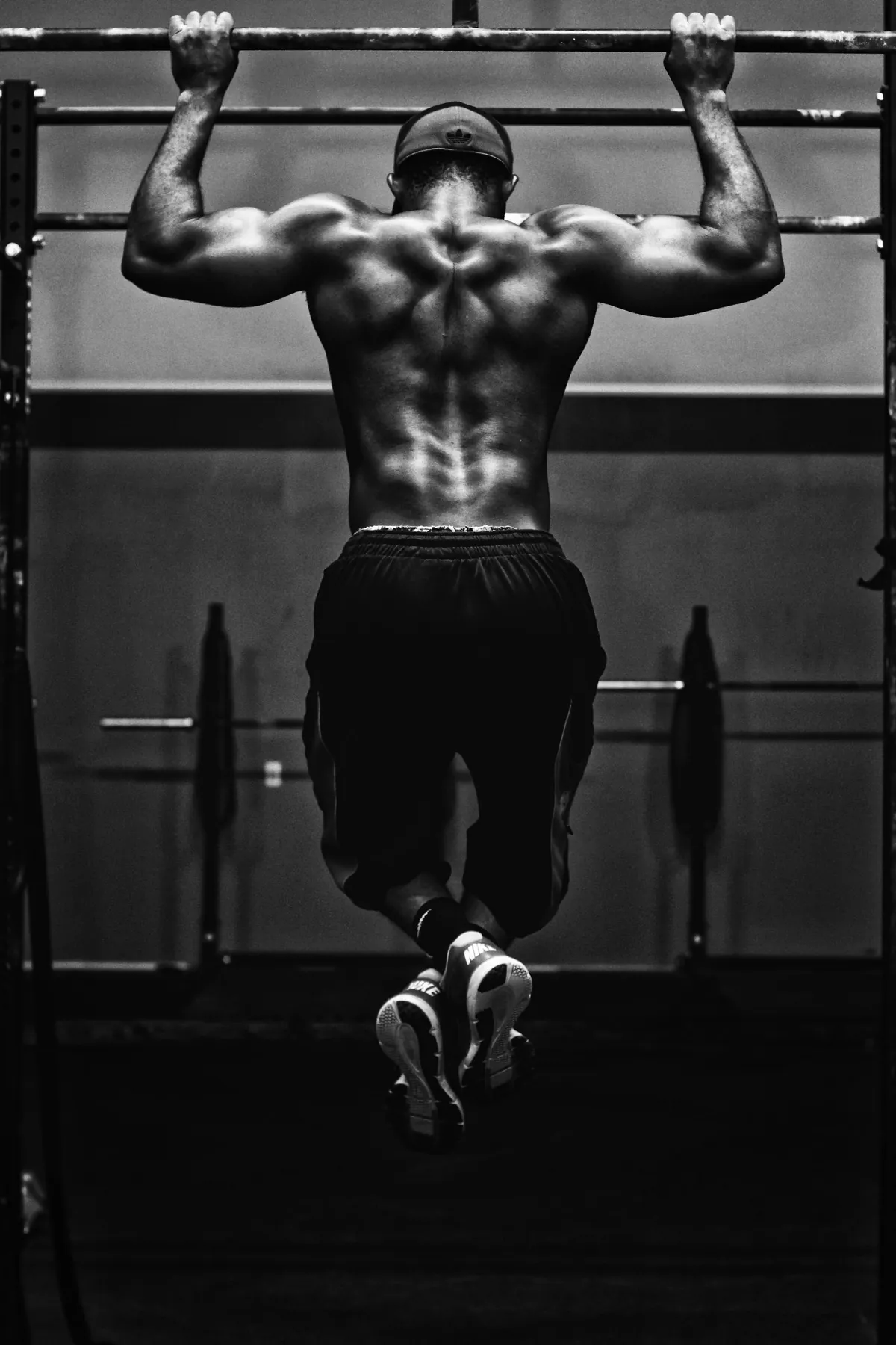 Coach cueing an athlete through a lift
